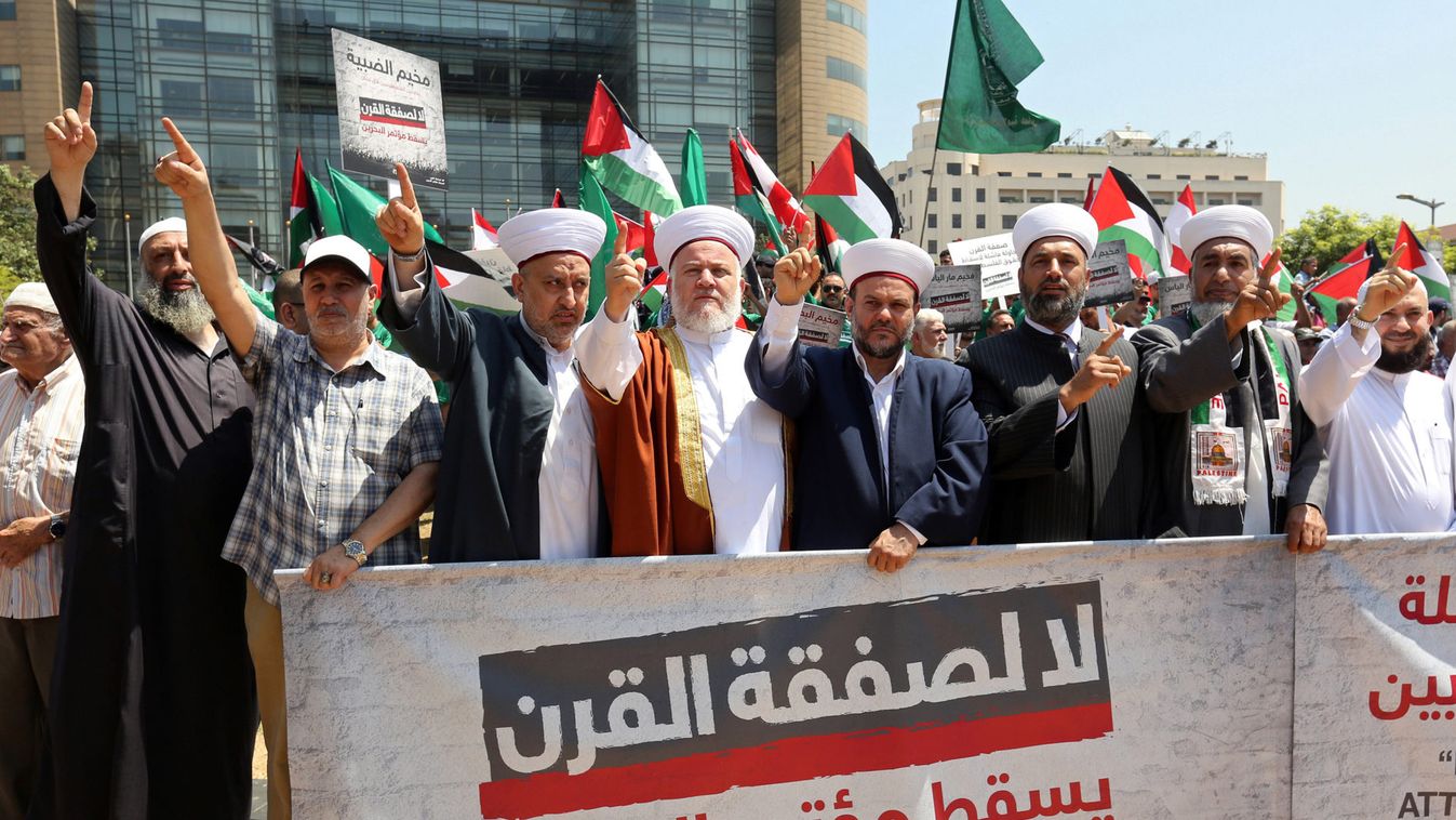 Religious figures gesture as they take part in a protest against Bahrain's conference about U.S. President Donald Trump's vision for Mideast peace plan, in front of the U.N. headquarters, in Beirut