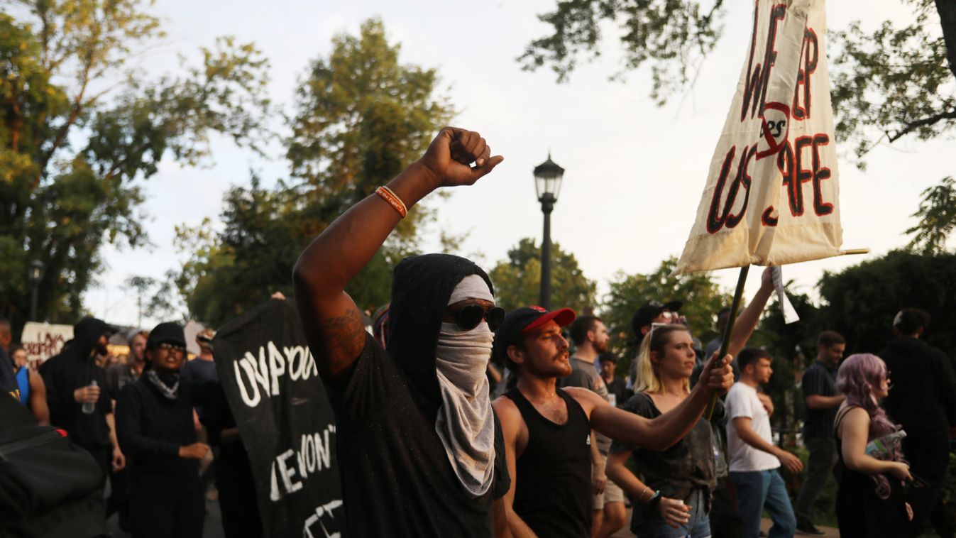 Protesters march at the University of Virginia in Charlottesville