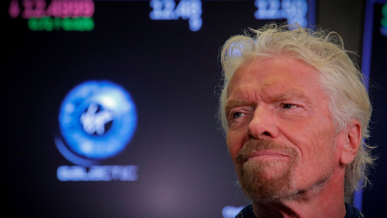 FILE PHOTO: Sir Richard Branson stands on floor of the NYSE  as Virgin Galactic (SPCE) begins public trading in New York
