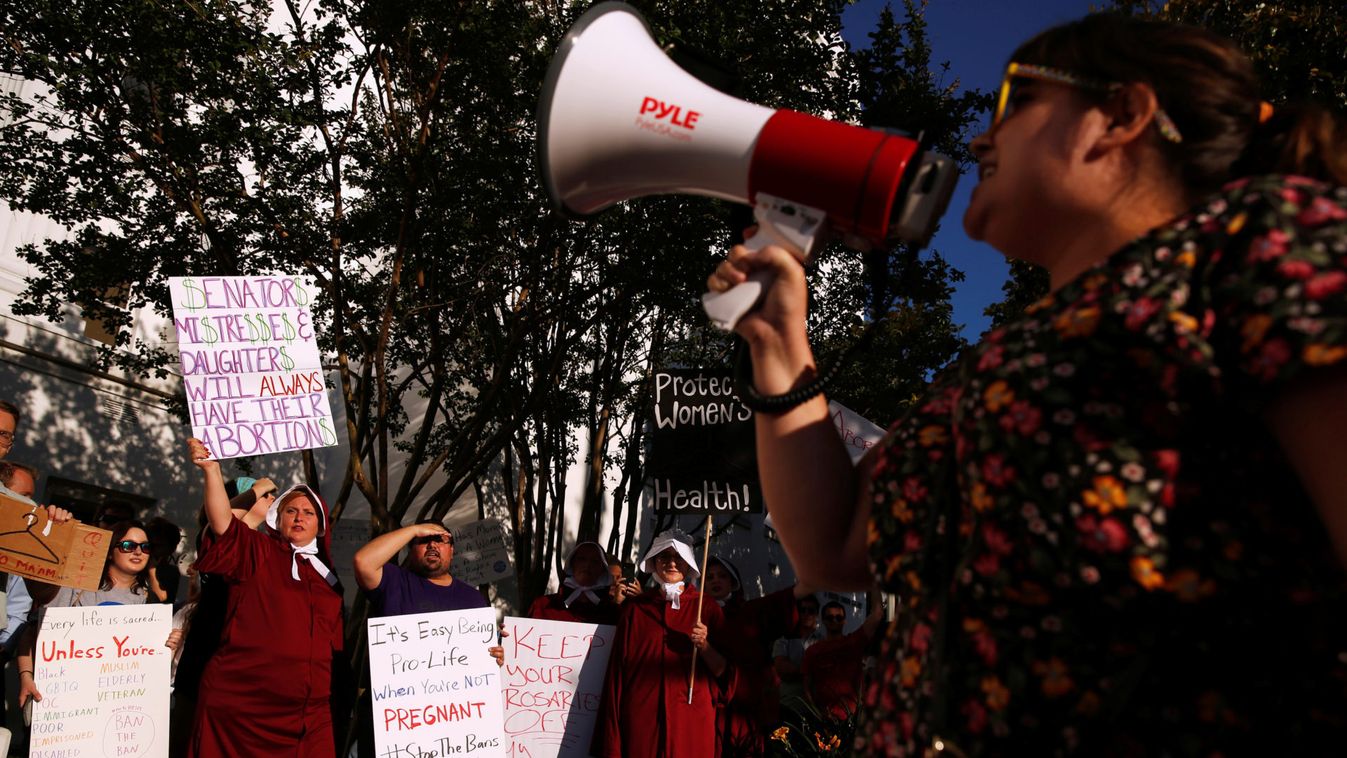 Pro-choice supporters protest in front of the Alabama State House as Alabama state Senate votes on the strictest anti-abortion bill in the United States at the Alabama Legislature in Montgomery