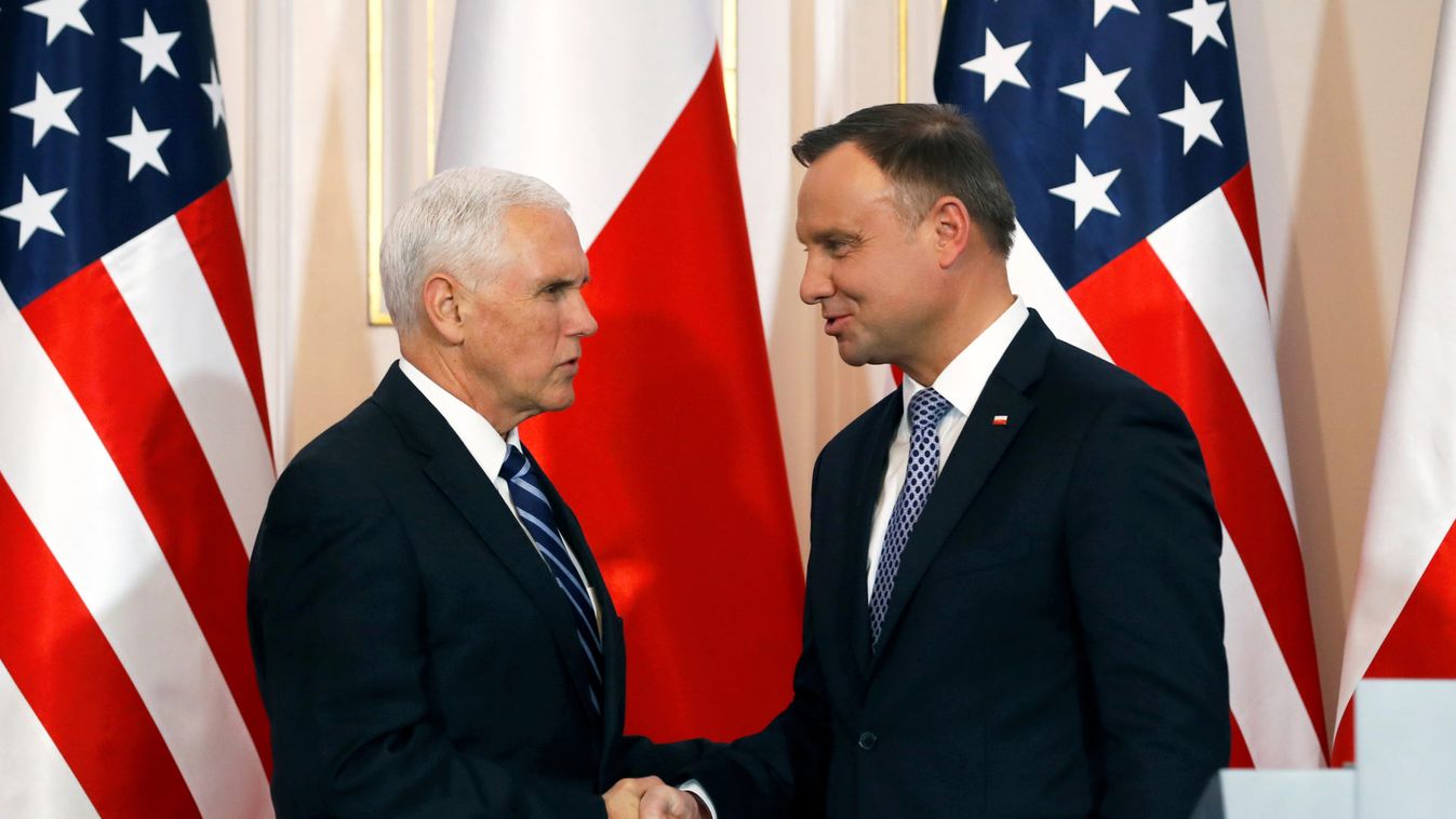 U.S. Vice President Mike Pence and Polish President Andrzej Duda shake hands during a joint news conference at Belvedere Palace in Warsaw