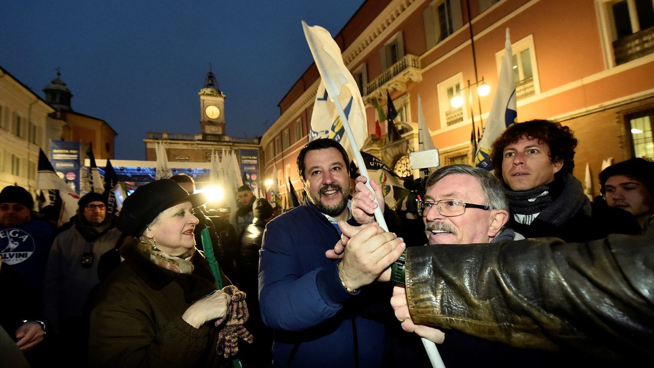 Leader of Italy's far-right League party Matteo Salvini greets supporters as he arrives at a rally ahead of a regional election in Emilia-Romagna, in Ravenna