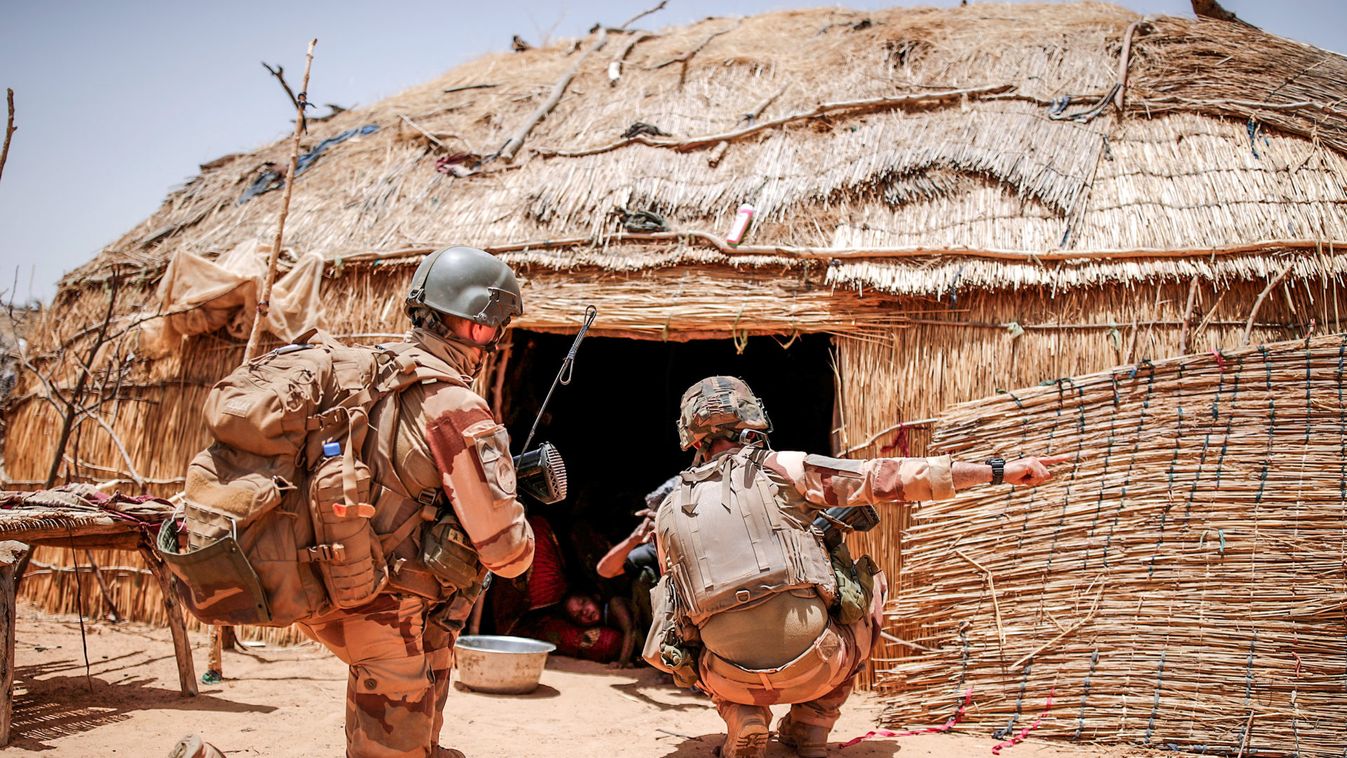 French soldiers of the "Belleface" Desert Tactical Group (GTD) control a touareg home in the Gourma region during the Operation Barkhane in Ndaki