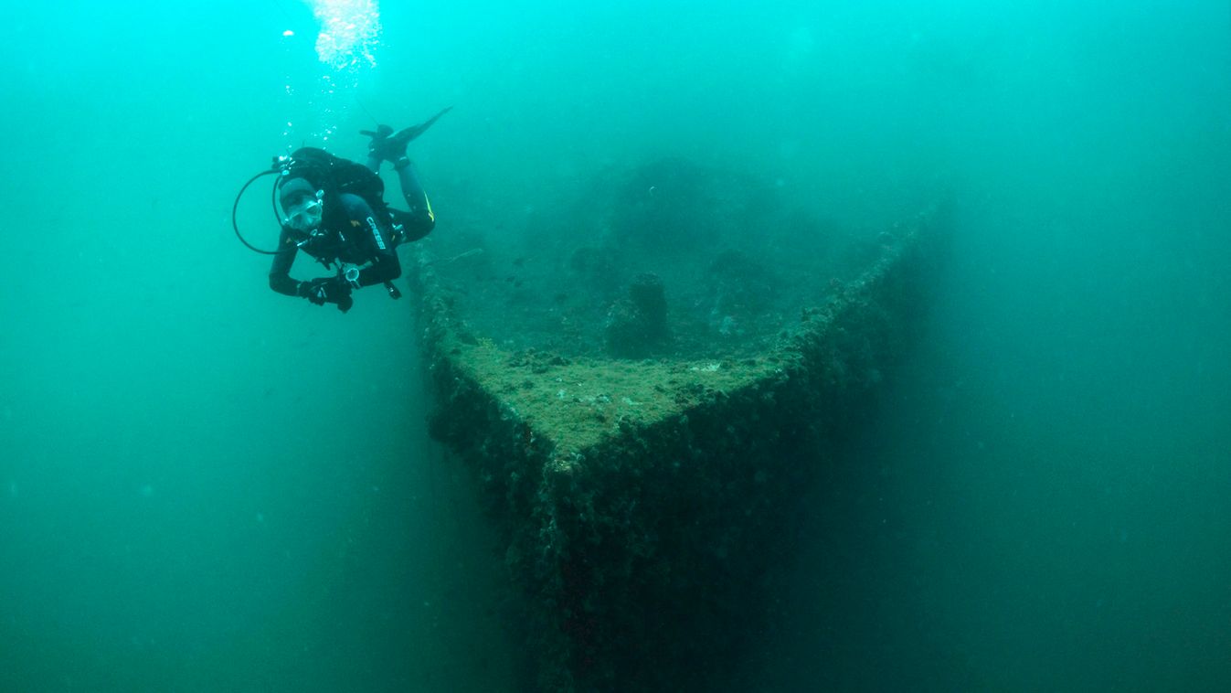 A diver swims near the bow of the wreck of the Baron Gautsch ship, near the Adriatic town of Rovinj