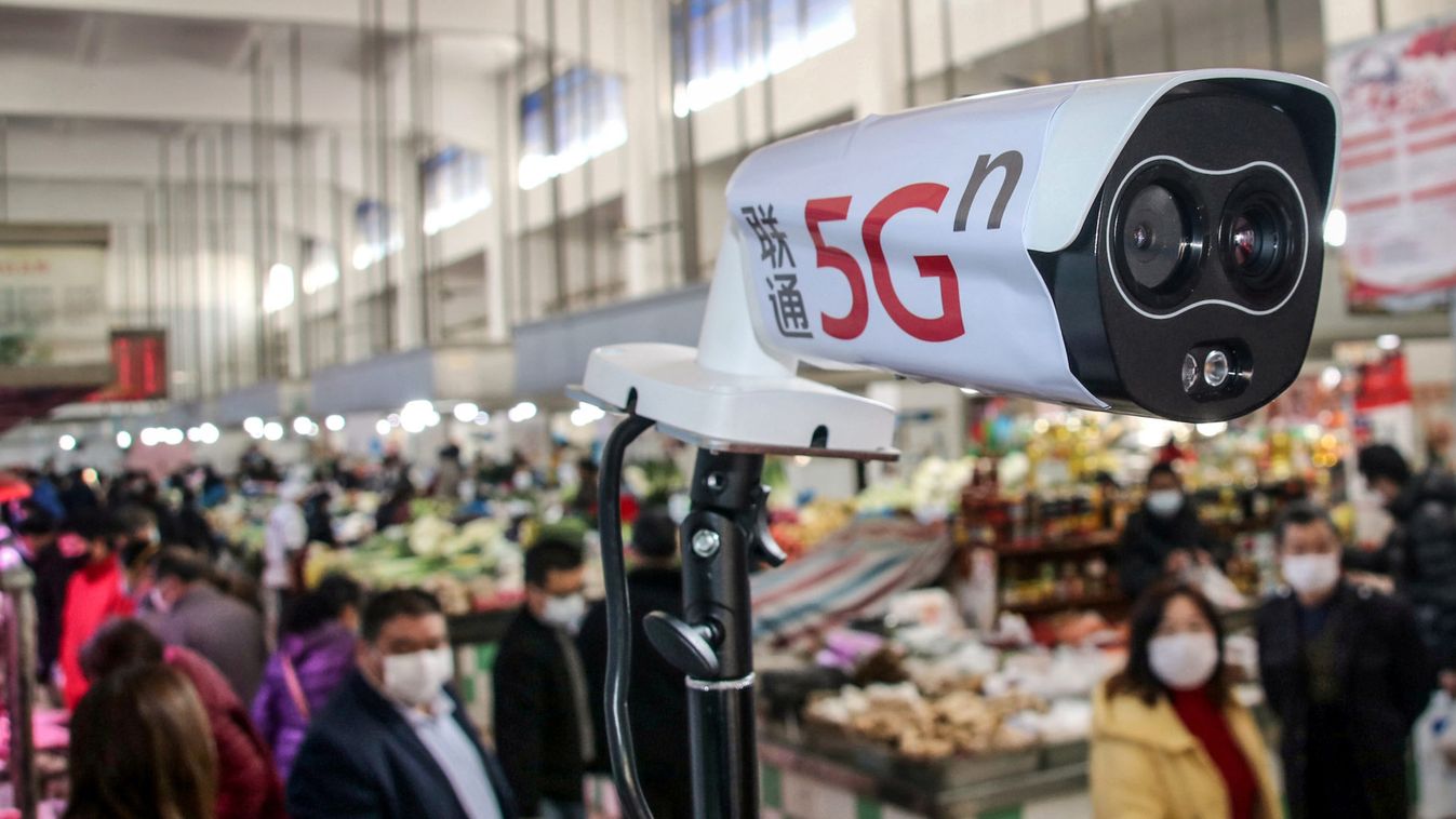 5G-powered camera to detect body temperature is seen at an agricultural market in Suzhou