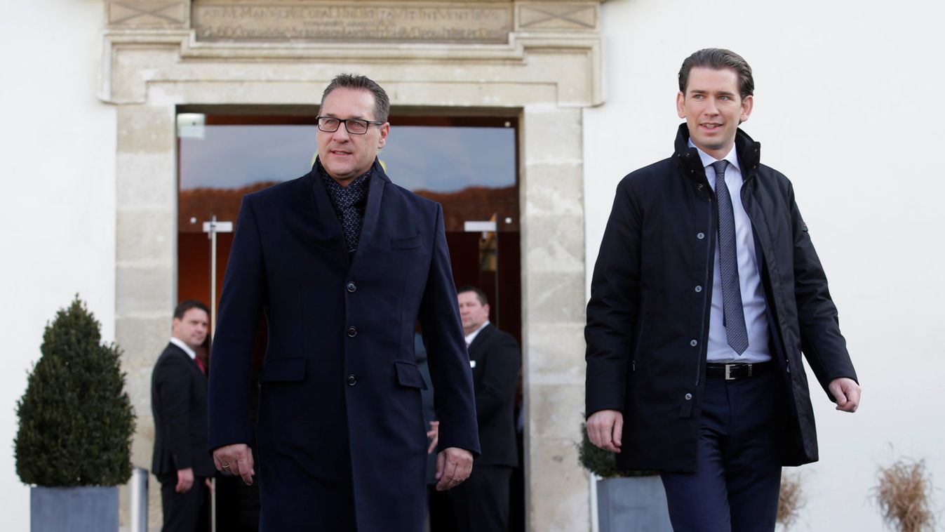 Austria's Vice Chancellor Strache and Chancellor Kurz arrive for a family photo during a two-day cabinet meeting in Seggau