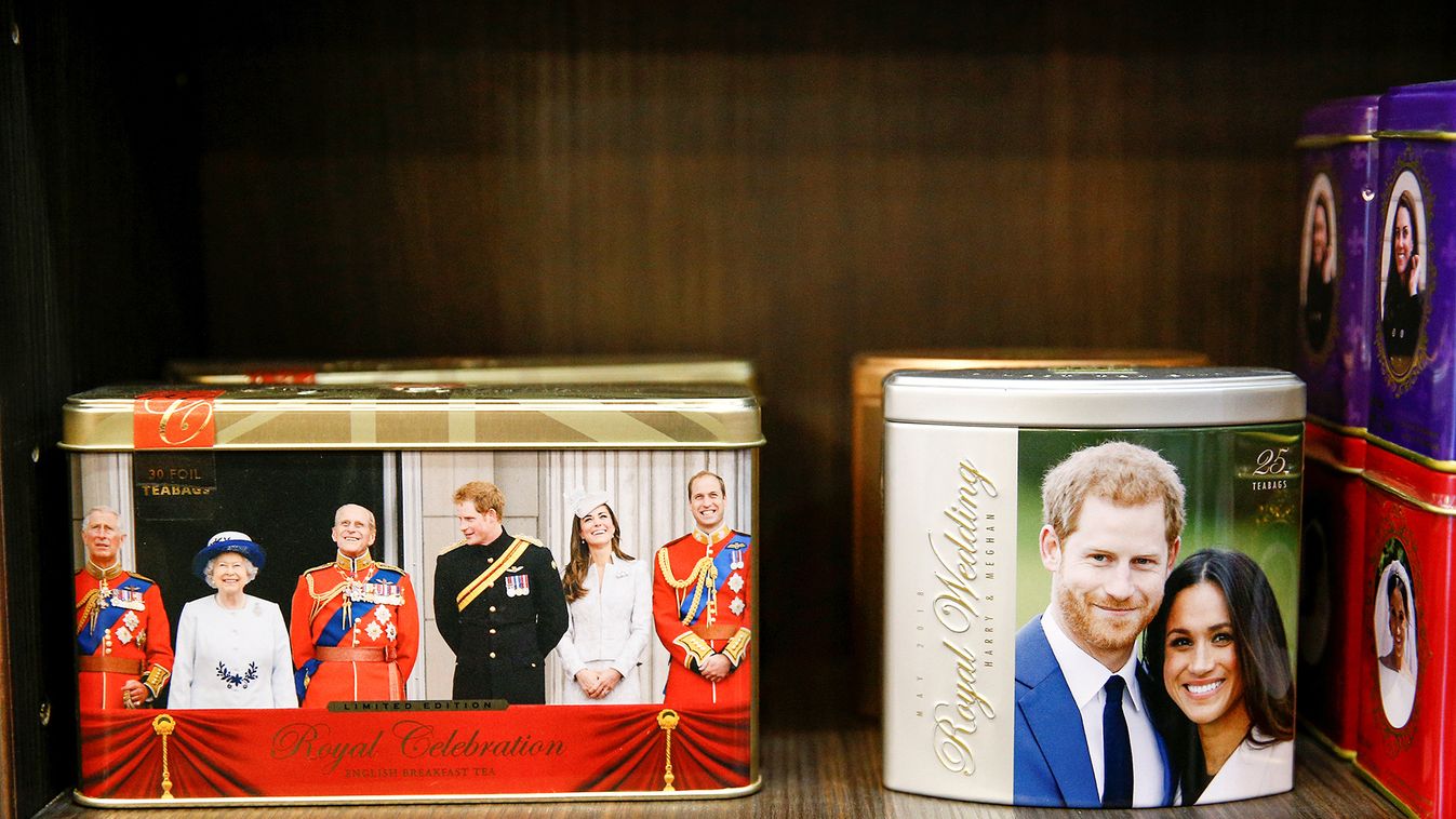 Merchandise depicting Britain's Prince Harry and Meghan, Duchess of Sussex, are seen on display in a souvenir shop near Buckingham Palace in London
