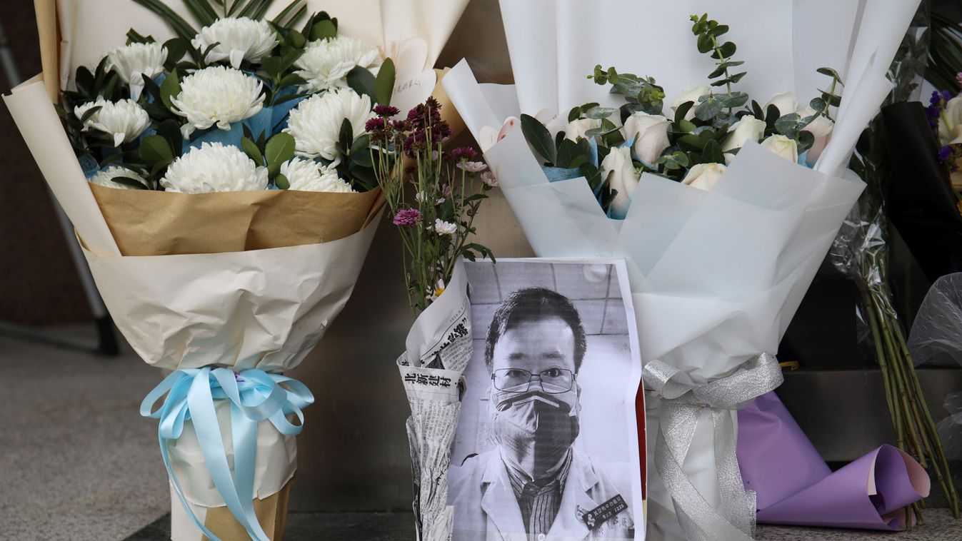 A makeshift memorial for Li Wenliang is seen at an entrance to the Central Hospital of Wuhan