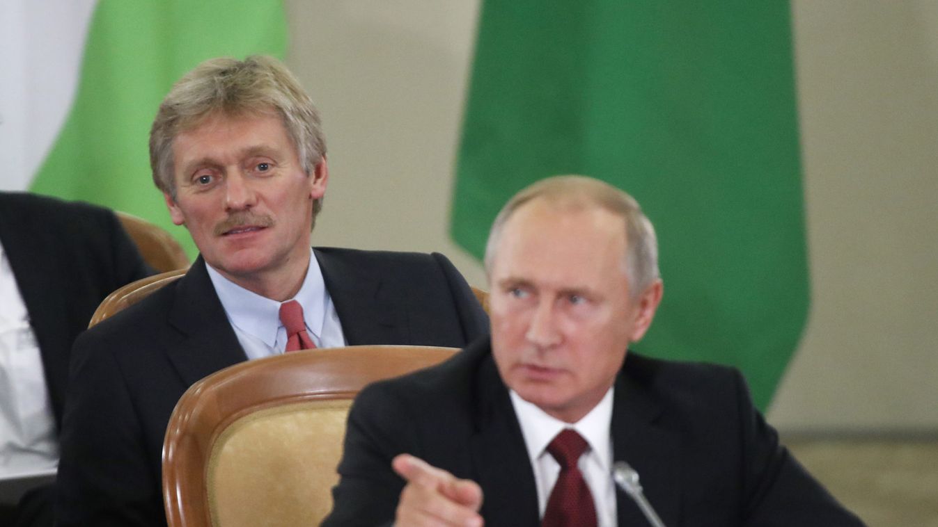Russia's President Putin and Kremlin spokesman Dmitry Peskov attend a session of the Council of Heads of the Commonwealth of Independent States in Sochi