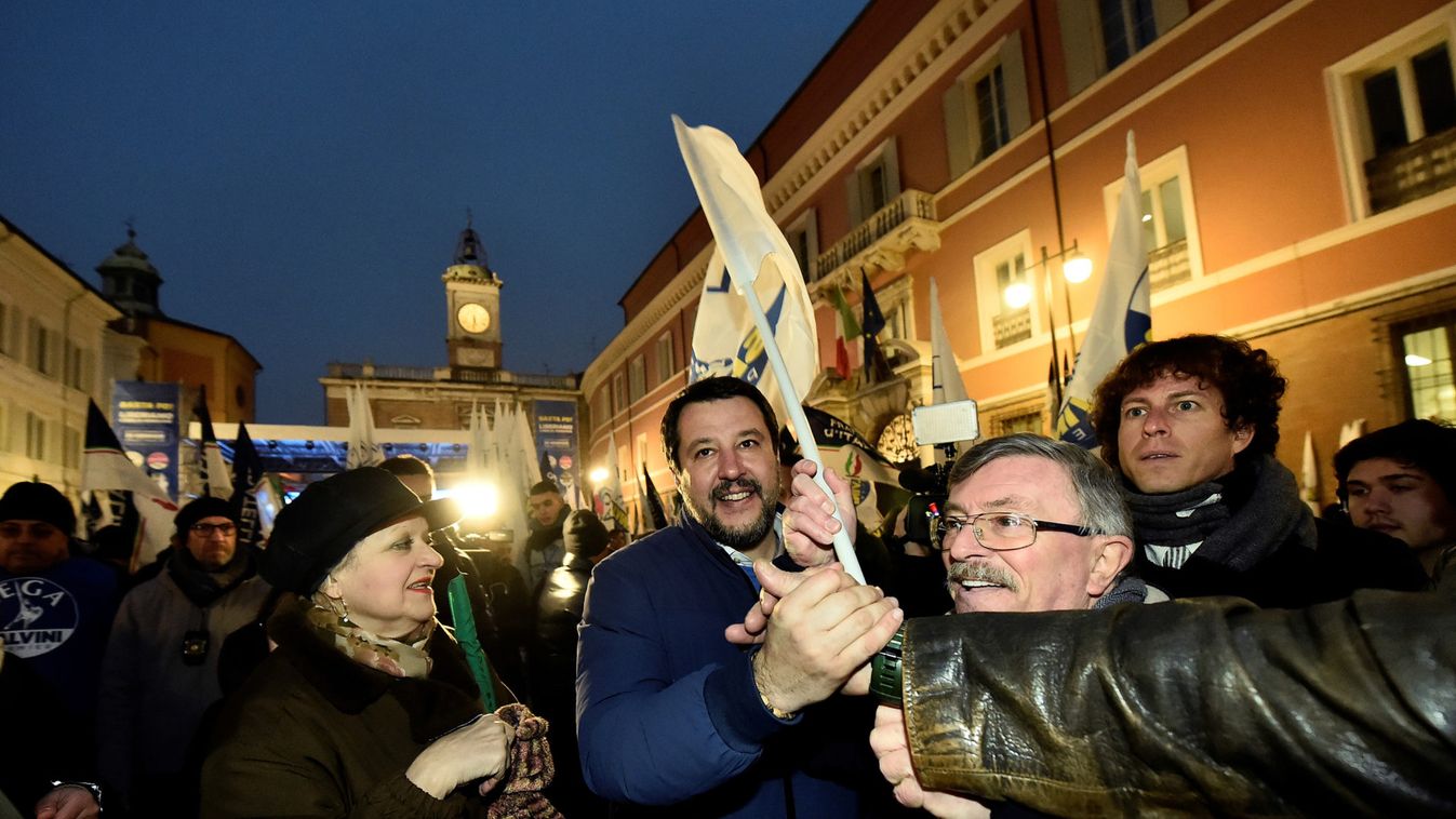 Leader of Italy's far-right League party Matteo Salvini greets supporters as he arrives at a rally ahead of a regional election in Emilia-Romagna, in Ravenna