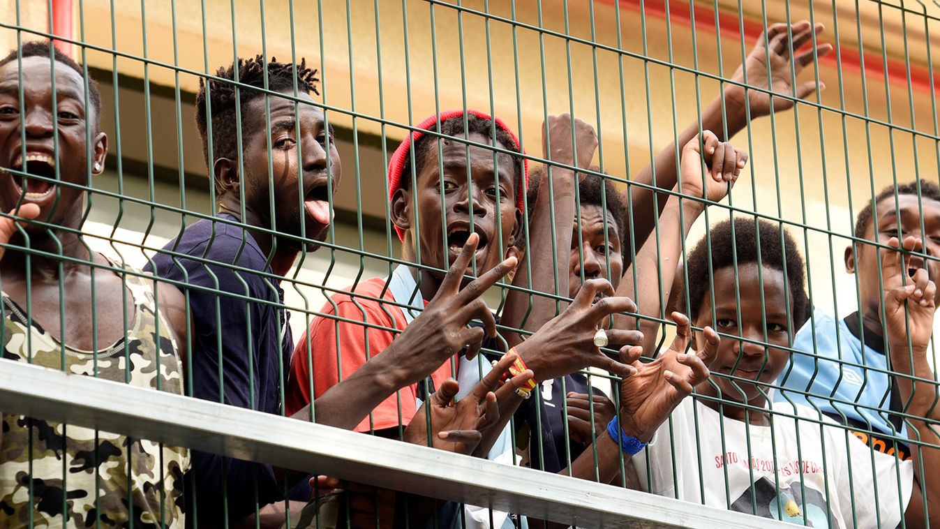 Migrants of the immigrant center CETI welcomes newly arrived African immigrants in the Spanish enclave Ceuta, after some 200 refugees crossed the border fence between Morocco and Ceuta