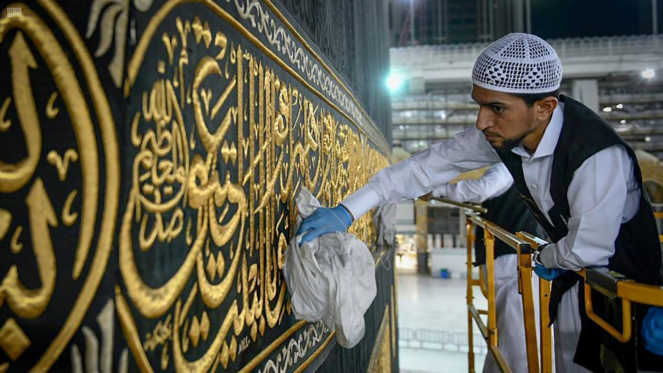 A worker cleans and sterilises the Kaaba, following the outbreak of the coronavirus disease (COVID-19), ahead of the holy fasting month of Ramadan, in the Grand mosque in the holy city of Mecca