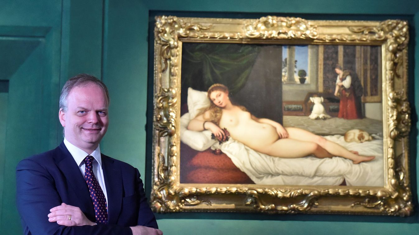 Director of the Uffizi Gallery Museum Eike Schmidt poses in front of the painting "Venus of Urbino" by Titian the day before the inauguration of fourteen new rooms dedicated to 16th and 17th century painters, at the Uffizi Gallery Museum in Florence