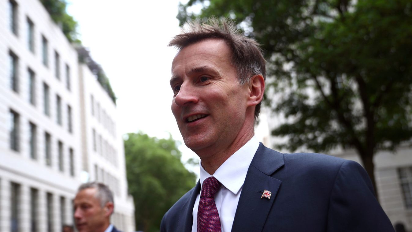 Britain's Foreign Secretary Jeremy Hunt arrives at his home in London