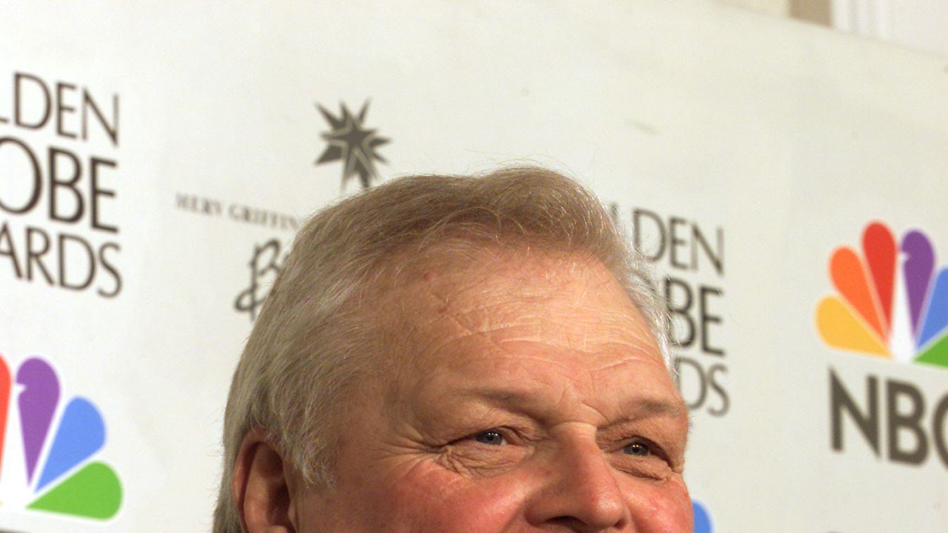 BRIAN DENNEHY POSES WITH HIS GOLDEN GLOBE.