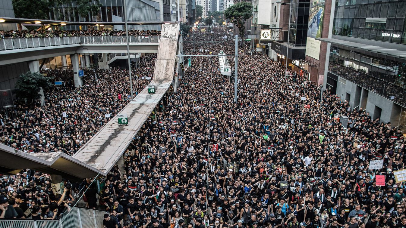 Protesters march to call for a complete withdrawal of the extradition bill.