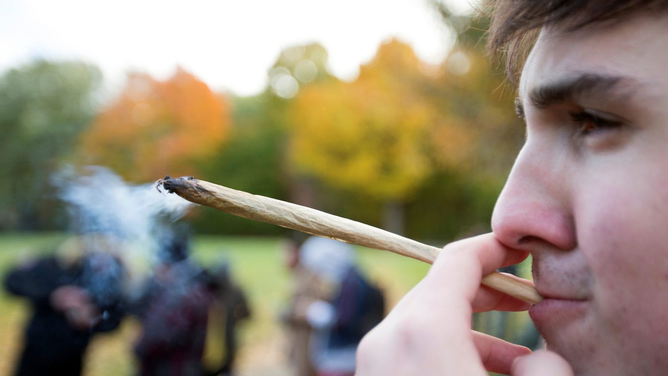 People smoke on the day Canada legalizes recreational marijuana in Montreal