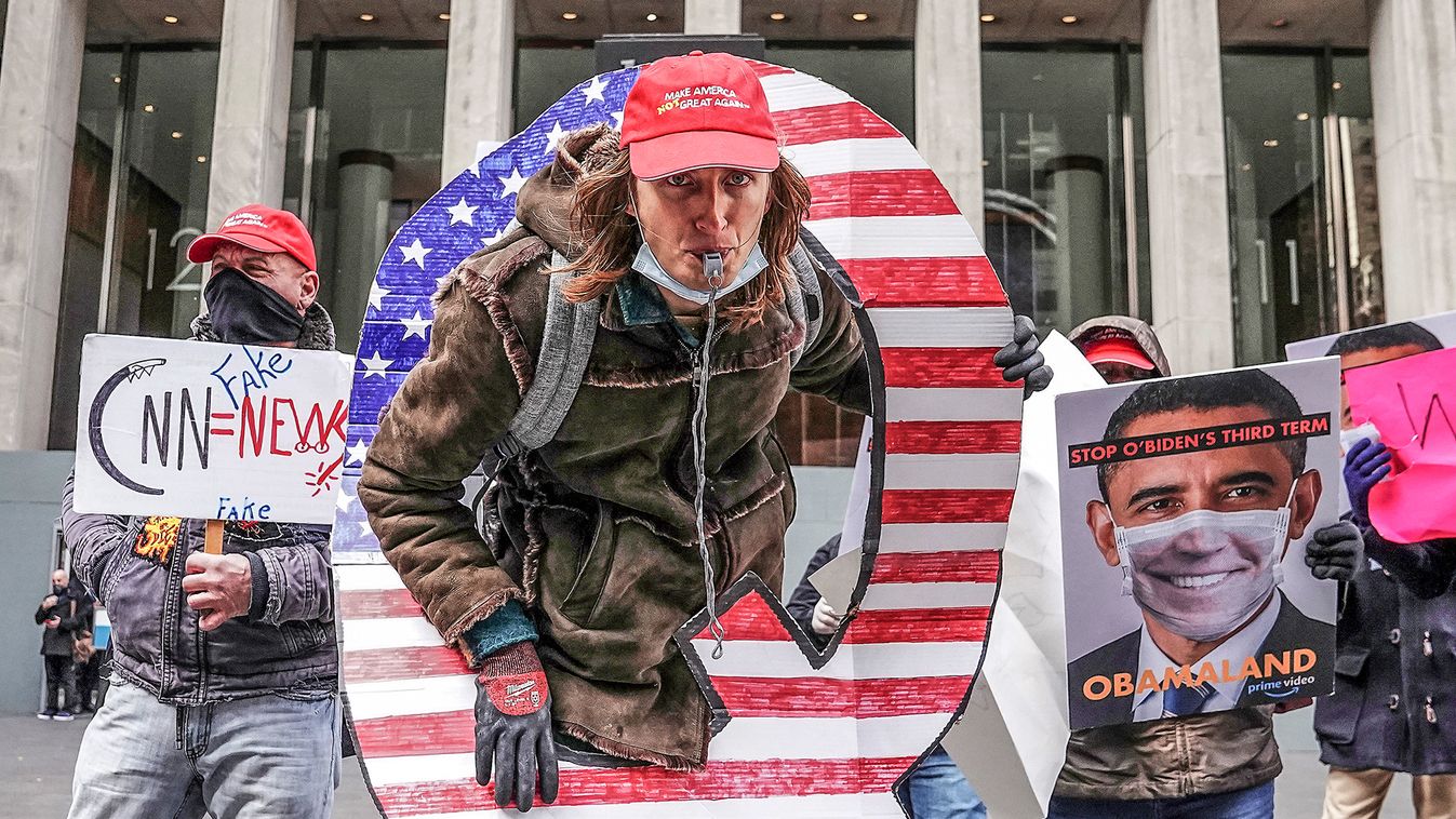 Qanon activists rally to show their support for Fox News outside their headquarters in New York City