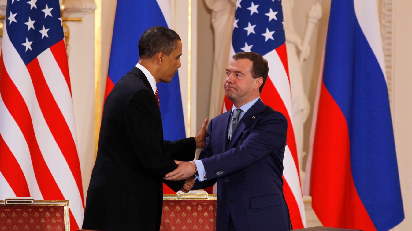 US President Obama and Russian President Medvedev shake hands after signing new Strategic Arms Reduction Treaty in Prague