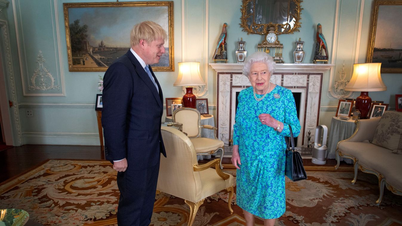 Queen Elizabeth II speaks to Boris Johnson during an audience in Buckingham Palace, where she will officially recognise him as the new Prime Minister, in London