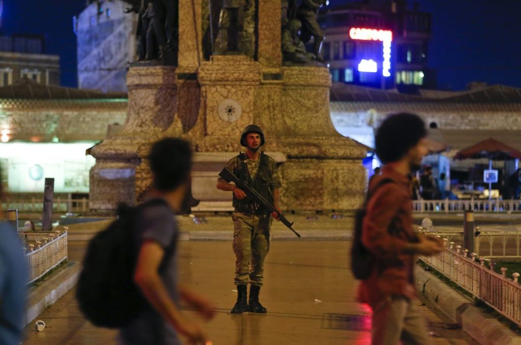 A Turkish military stands guard in the Taksim Square in Istanbul