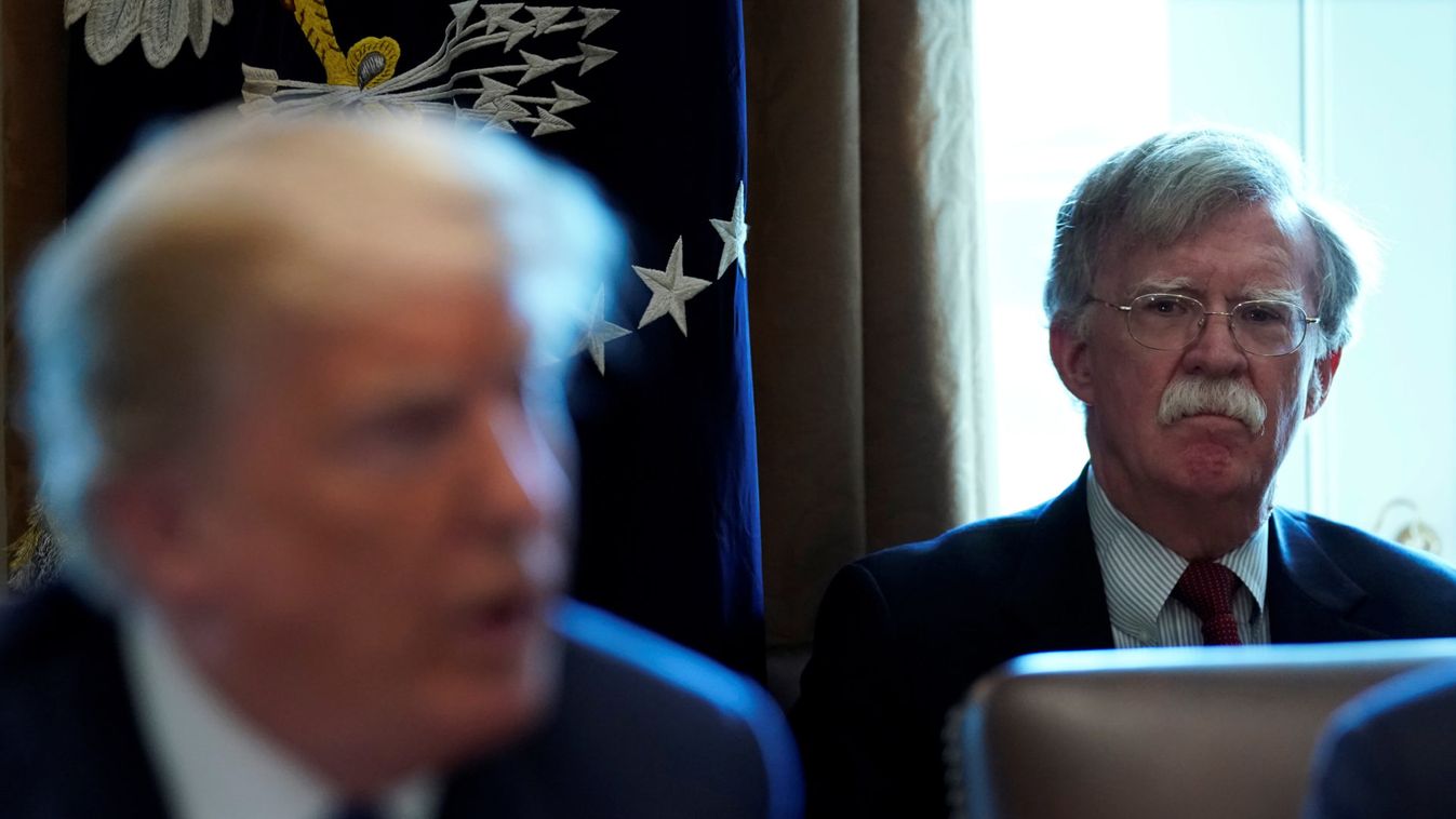Bolton listens as Trump holds a cabinet meeting at the White House in Washington