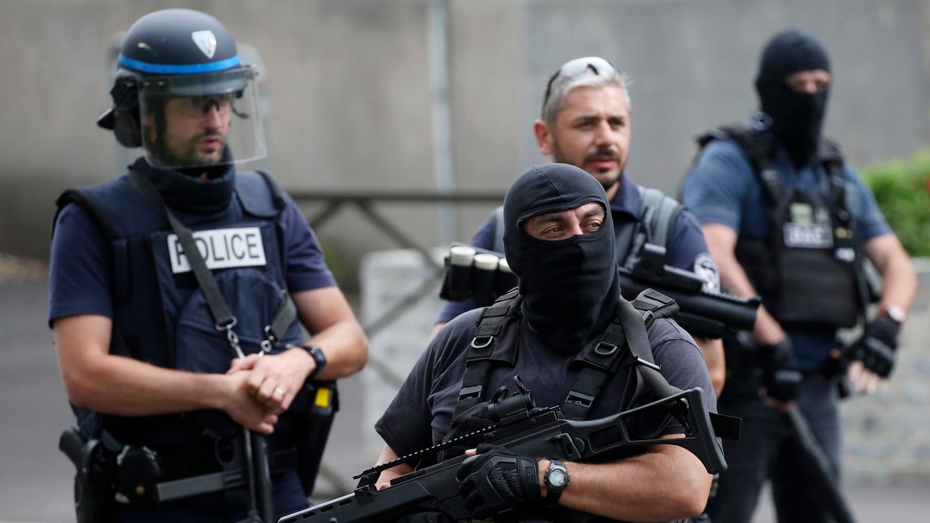 French police and anti-crime brigade secure a street as members of special forces carried out counter-terrorism swoop at different locations in Argenteuil, a suburb in northern Paris