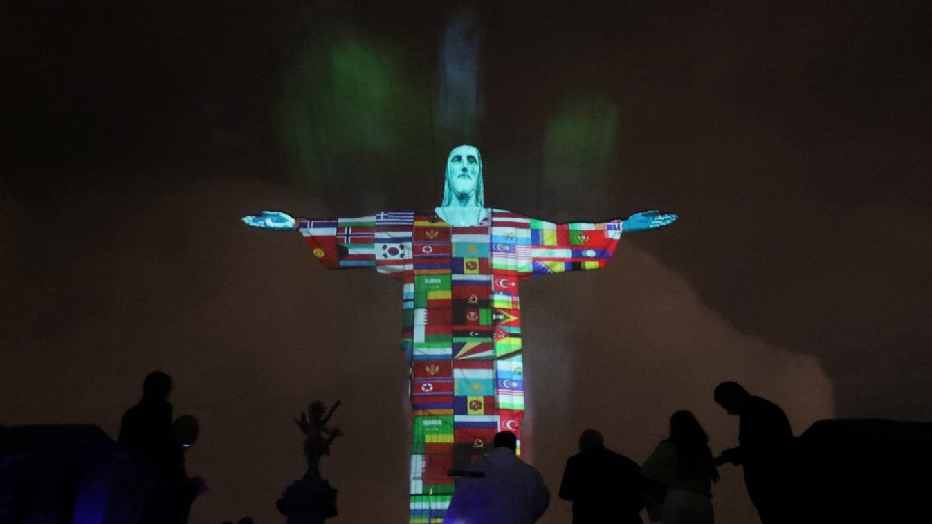  The statue of Christ the Redeemer is lit up in the colors of the countries that are affected by the coronavirus disease (COVID-19) outbreak in Rio de Janeiro