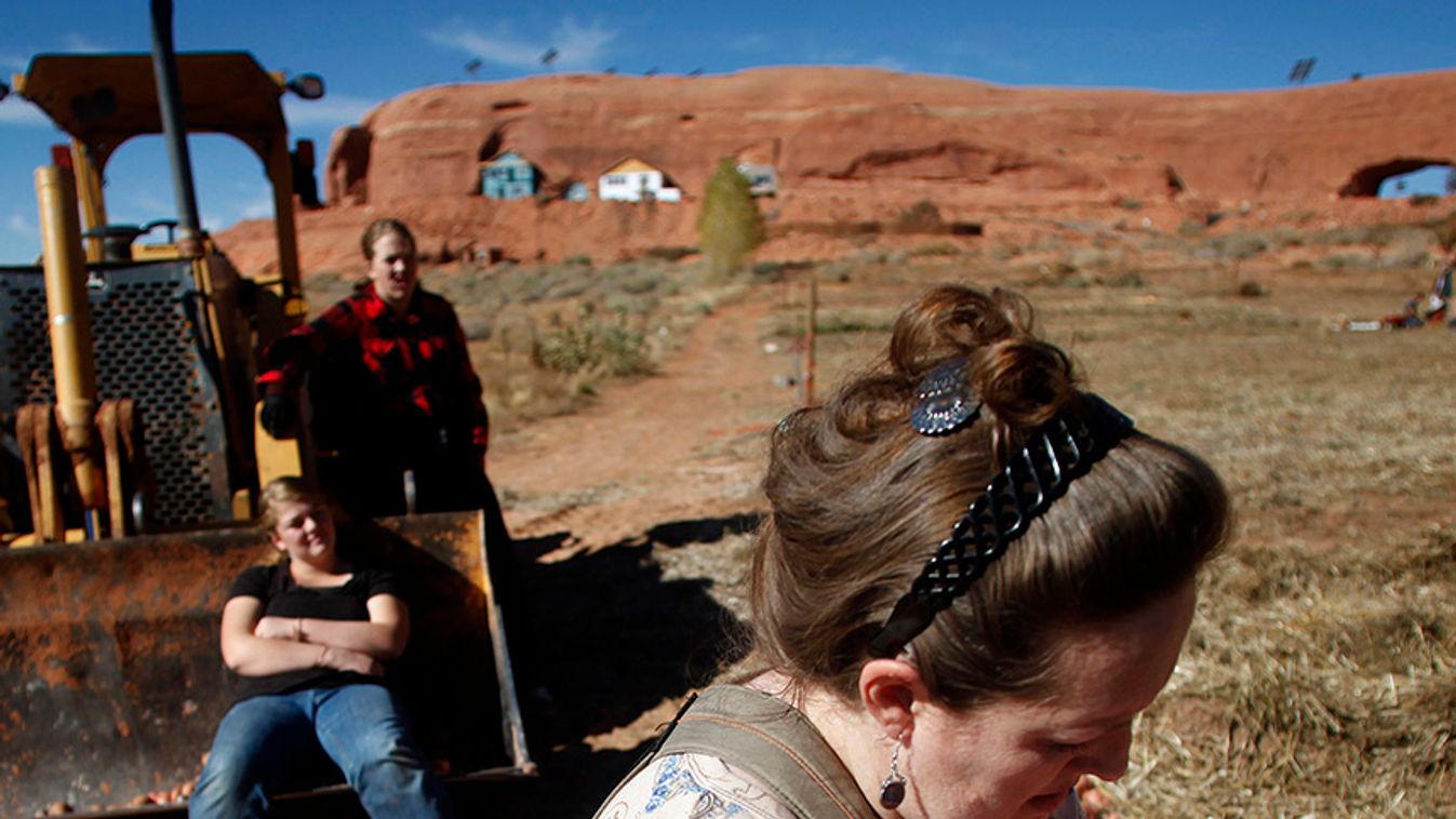Anna Knecht tends to her newborn daughter at the Rockland Ranch community outside Moab