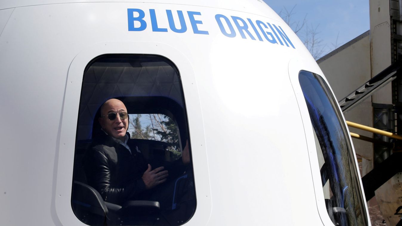 FILE PHOTO: Amazon and Blue Origin founder Jeff Bezos addresses the media about the New Shepard rocket booster and Crew Capsule mockup at the 33rd Space Symposium in Colorado Springs