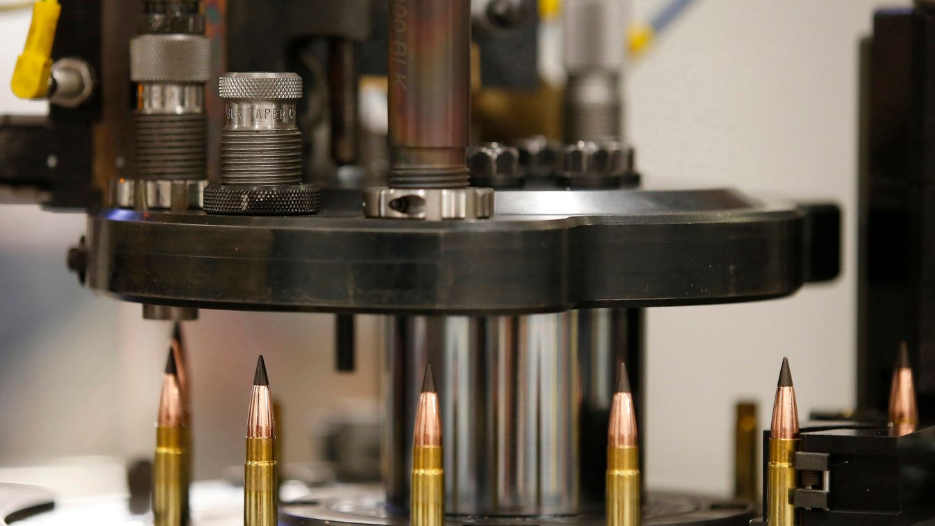 A machine assembles powder, cartridges and bullet tips together to make a .308 caliber round at Barnes Bullets in Mona, Utah
