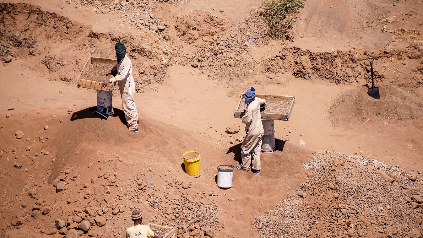 Illegal diamond miners known locally as "zama-zamas" are seen from the air as they work in Kimberley