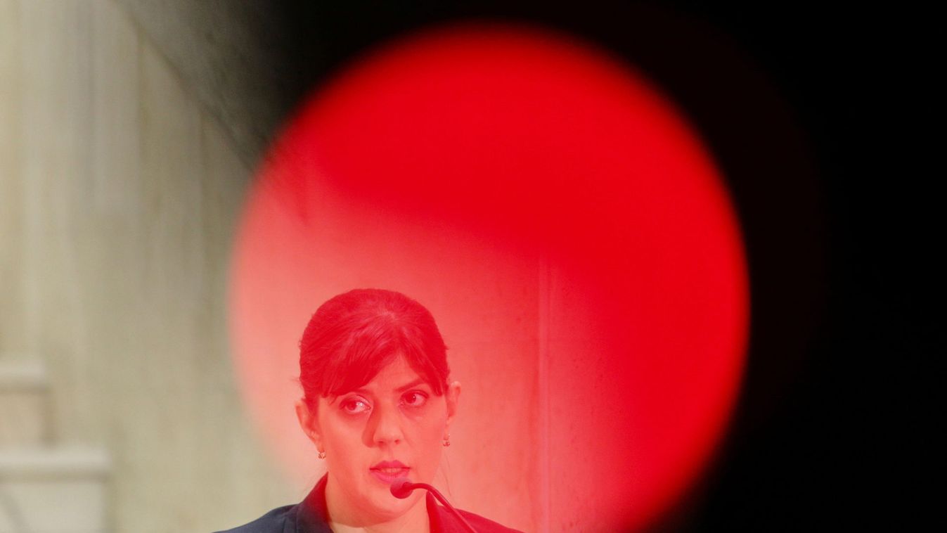 Chief anti-corruption prosecutor Laura Codruta Kovesi is pictured through a red led light while delivering a speech during a press conference