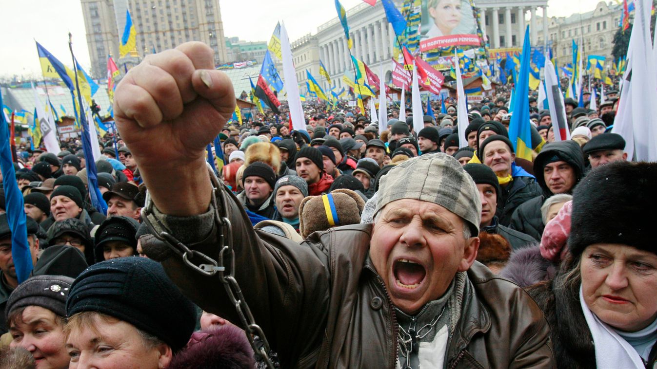 A man shouts slogans during a rally organized by supporters of EU integration at Maidan Nezalezhnosti or Independence Square in central Kiev