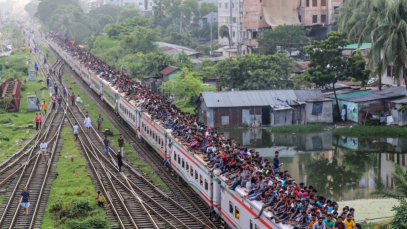 People Ride On Overcrowded Train In Bangladesh