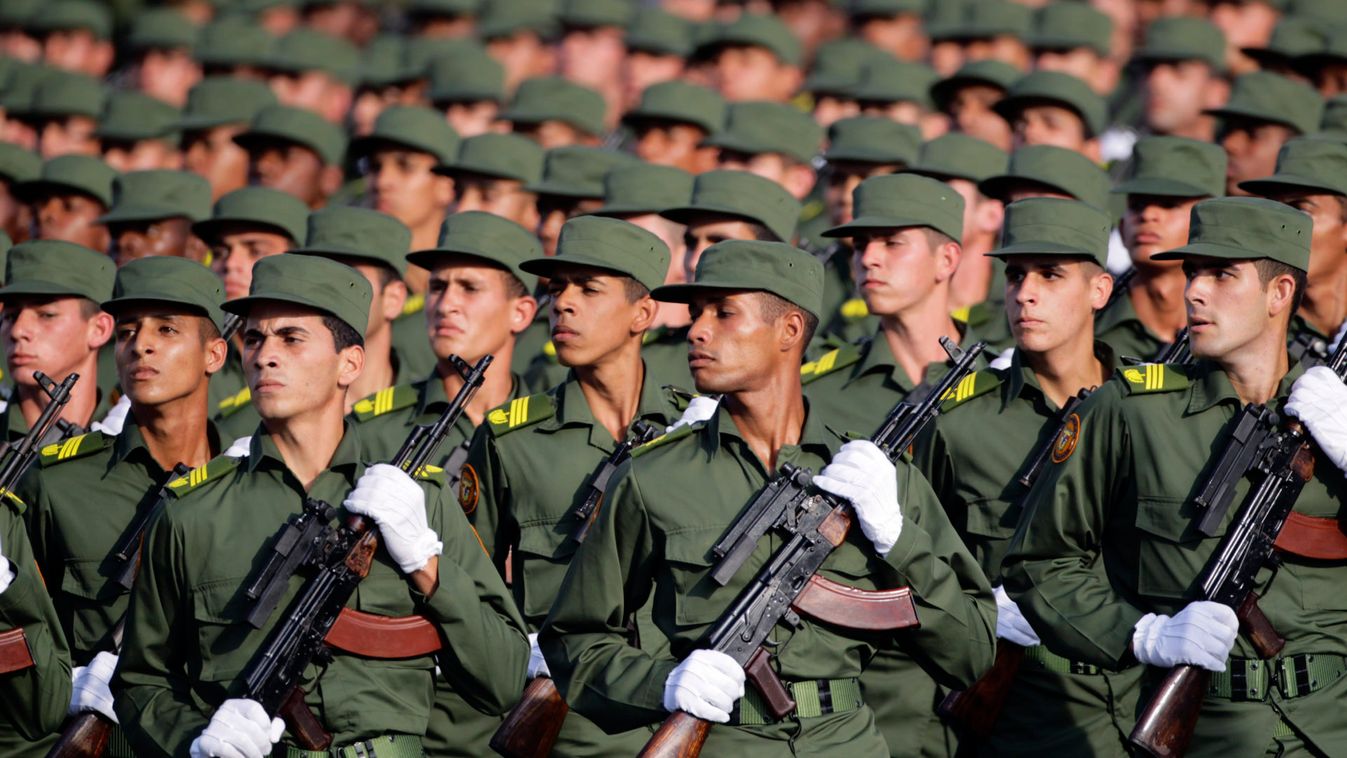 Cuban soldiers march during a military parade in Havana's Revolution Square