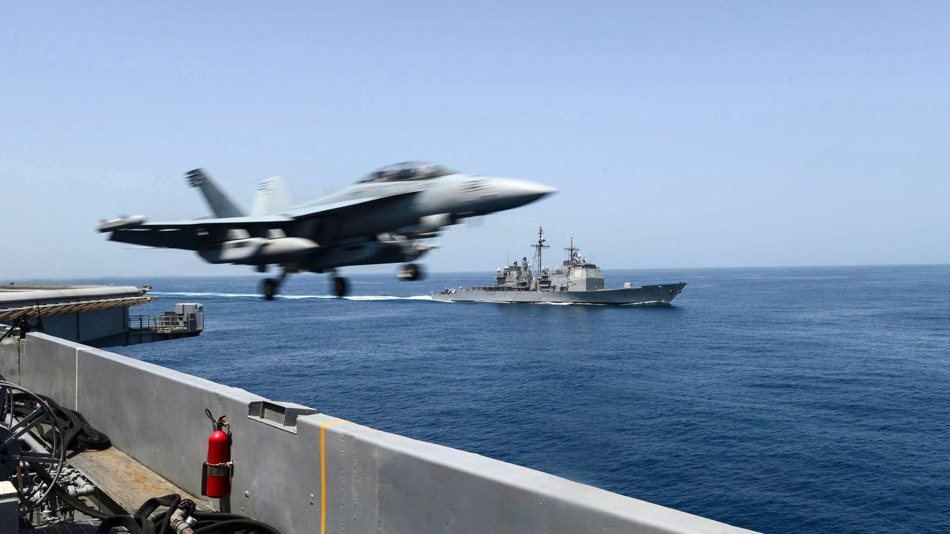 An EA-18G Growler launches from the flight deck of the aircraft carrier USS Theodore Roosevelt in Arabian Sea