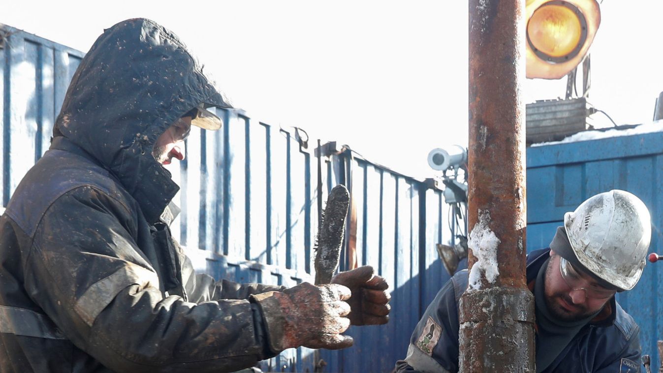 Drilling crew members work at an oil rig in the Irkutsk Oil Company-owned Yarakta Oil Field in Irkutsk Region