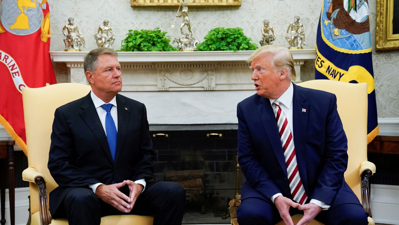 U.S. President Donald Trump meets with Romania's President Klaus Iohannis in the Oval office of the White House In Washington