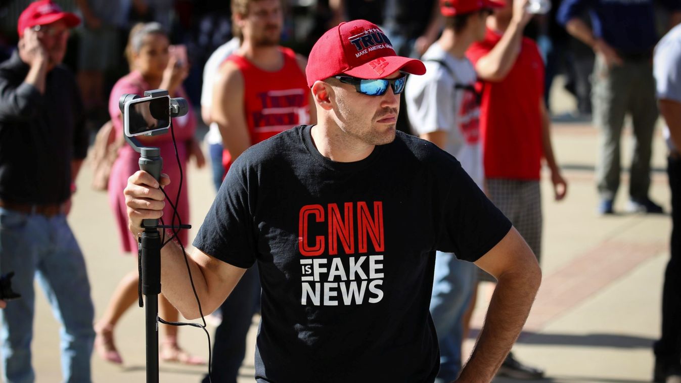 A Trump supporter wears a "CNN is fake news" t-shirt at a “Turn California Red” rally in Sacramento