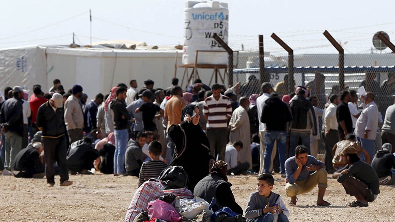 Syrians refugees wait to register their names to go back to their homeland in Al-Zaatari
