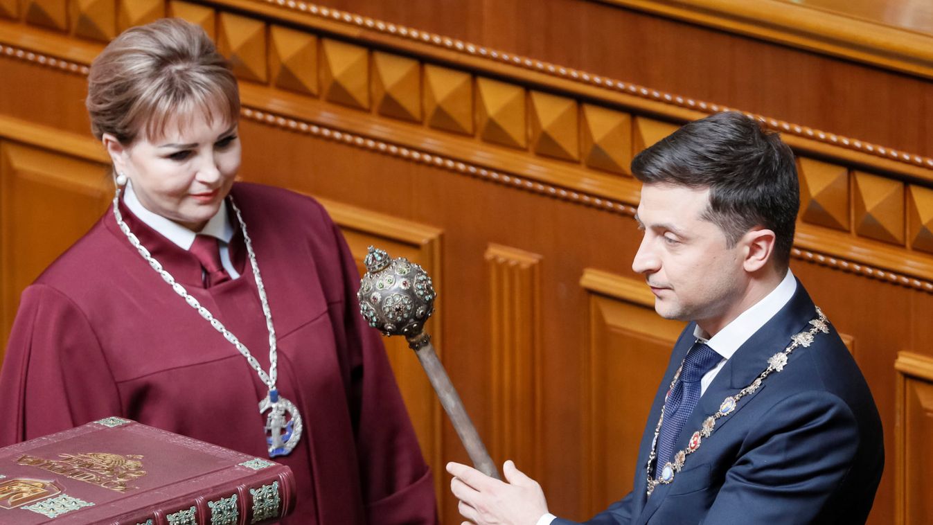 Ukraine's President-elect Zelenskiy receives presidential mace from Chairman of the Constitutional Court of Ukraine Shaptala during inauguration ceremony in Kiev