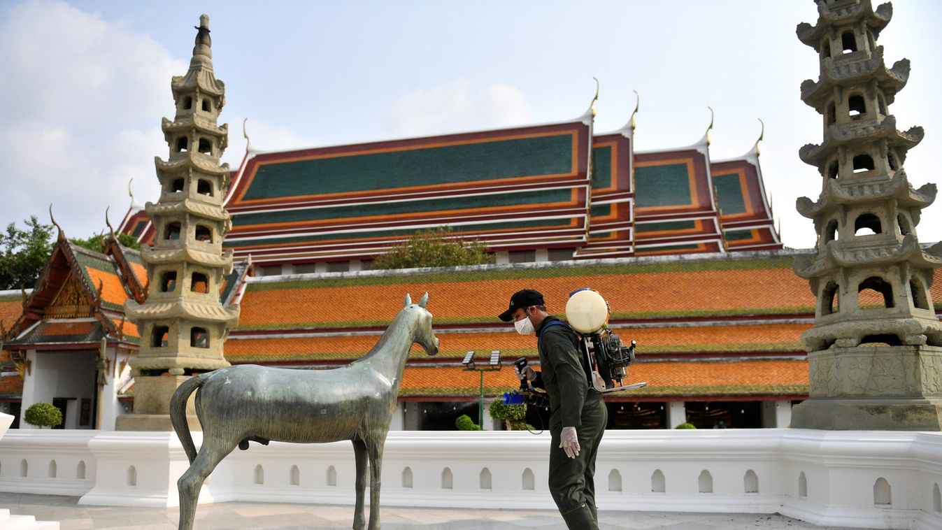 Measures to protect against the coronavirus outbreak inside Wat Suthat Thepwararam temple in Bangkok
