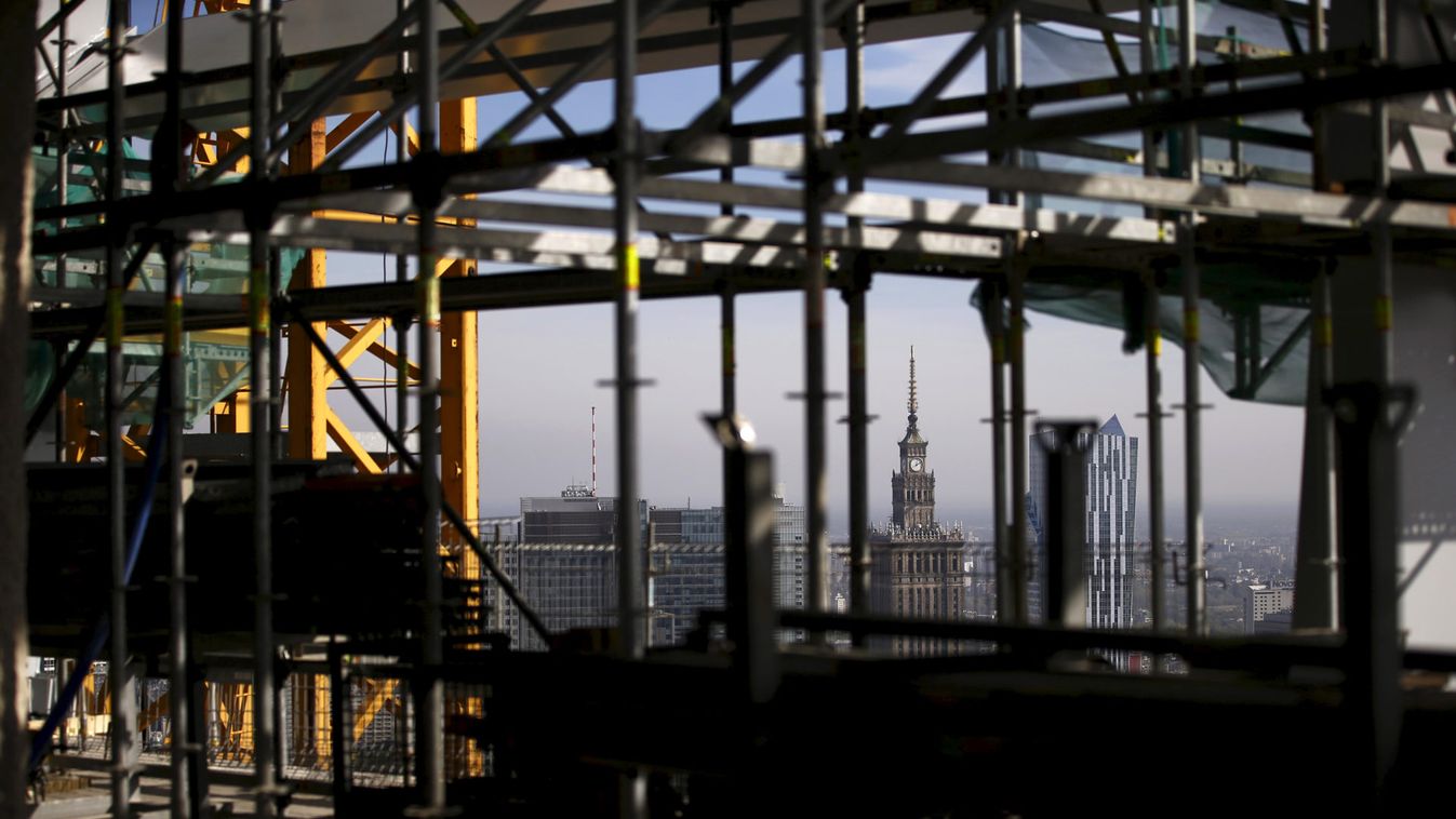The Palace of Culture is seen through the construction site of the new skyscraper in Warsaw, Poland