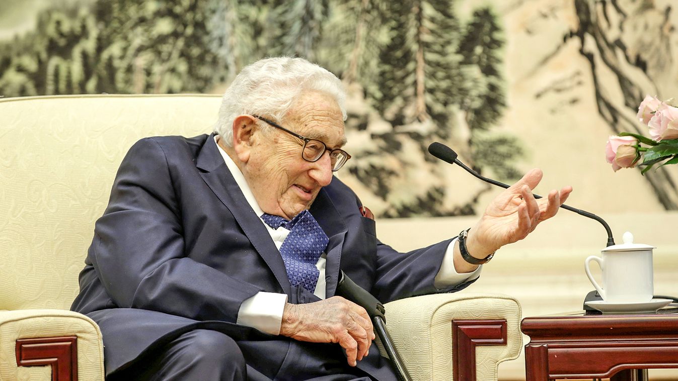 Former U.S. Secretary of State Henry Kissinger speaks during a meeting with Chinese Foreign Minister Wang Yi in Beijing