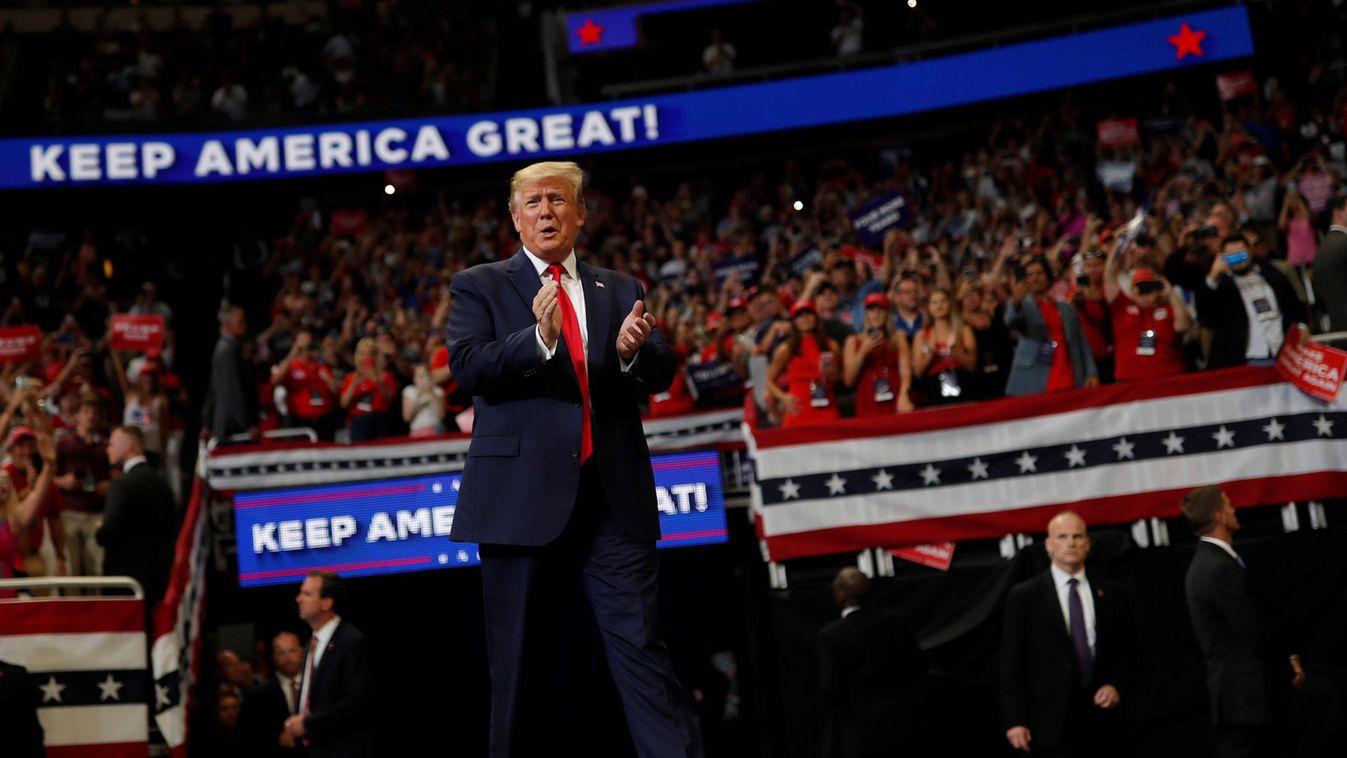 U.S. President Donald Trump reacts on stage formally kicking off his re-election bid with a campaign rally in Orlando