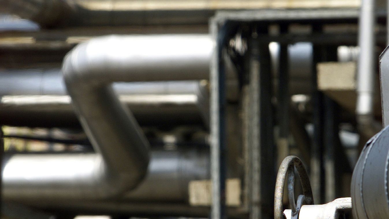 A Romanian works at "Petrobrazi", SNP Petrom's biggest refinery, near Ploiesti, [60km north of Bucha..