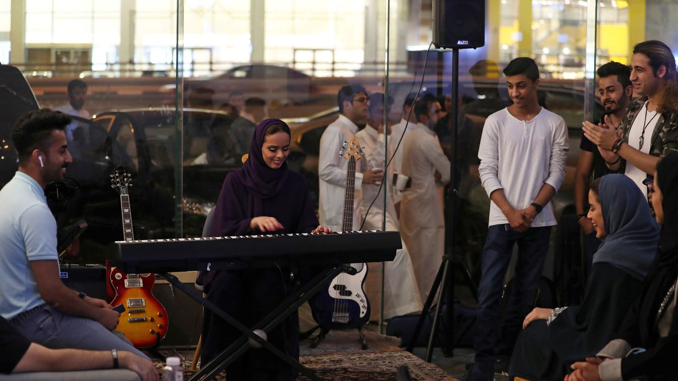 Saudi female musician, Lojain Sami, plays piano at a local musical themed cafe "Lojain Alkhursani" in Khobar