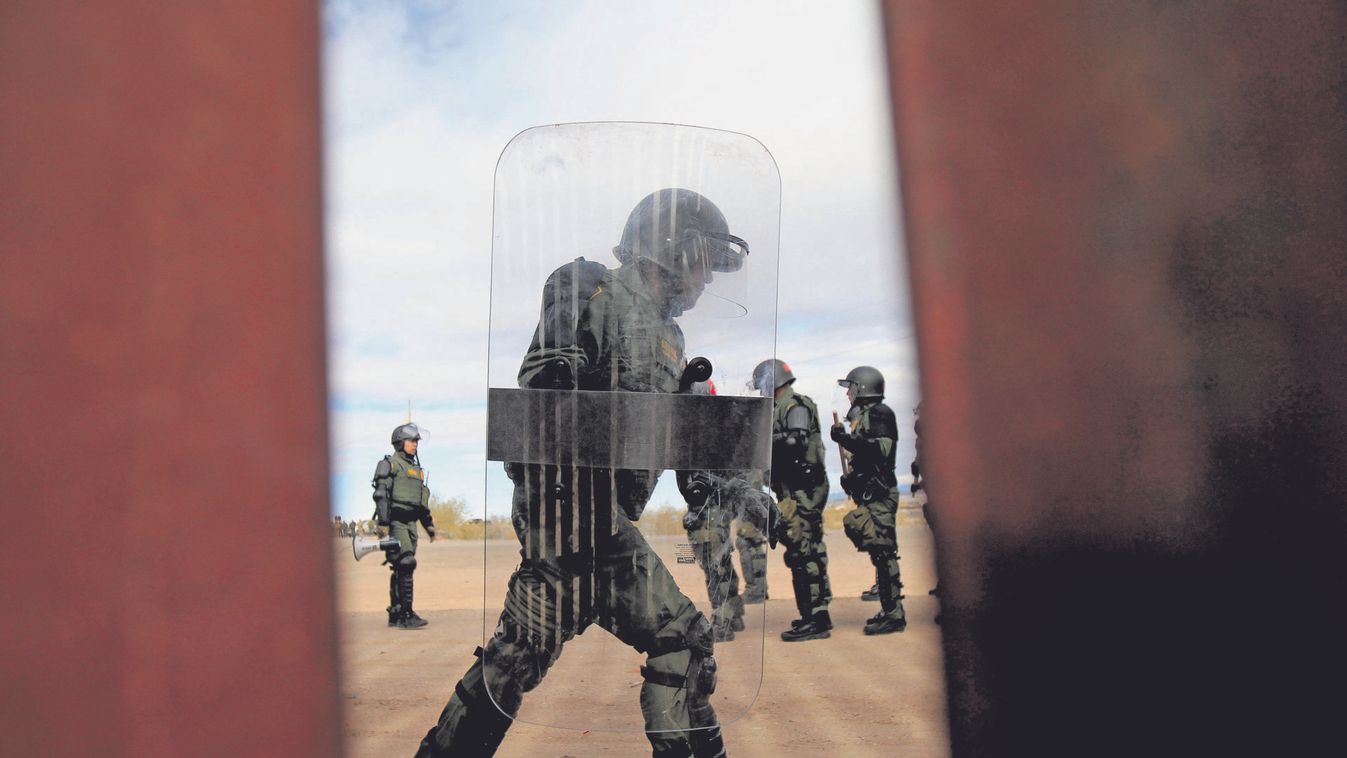 Agents of El Paso Sector U. S. Border Patrol conduct a Mobile Field Force training exercise in the Anapra area of Sunland Park, New Mexico, as seen from the Mexican side of the border in Ciudad Juarez