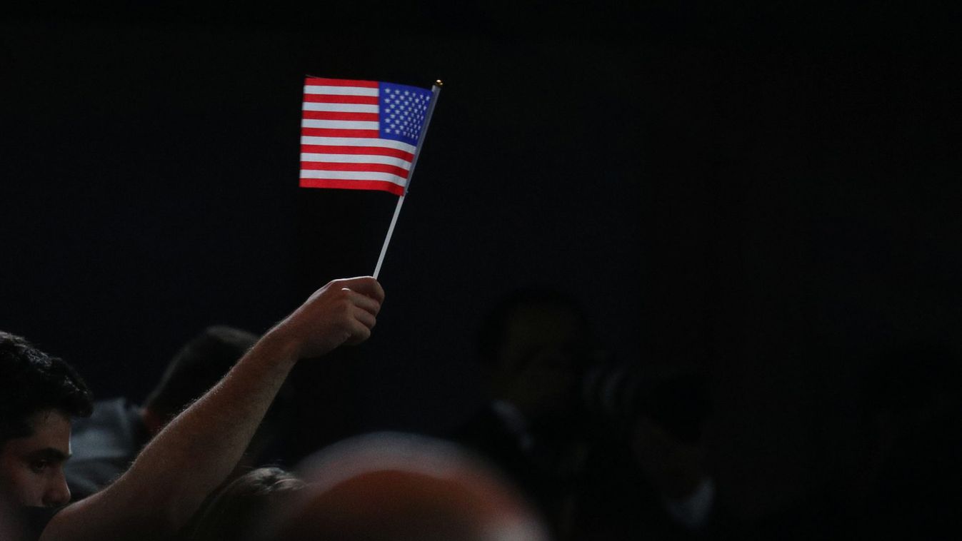 An audience member waves an American flag before a speech by U.S. President Trump in Hollywood, Florida